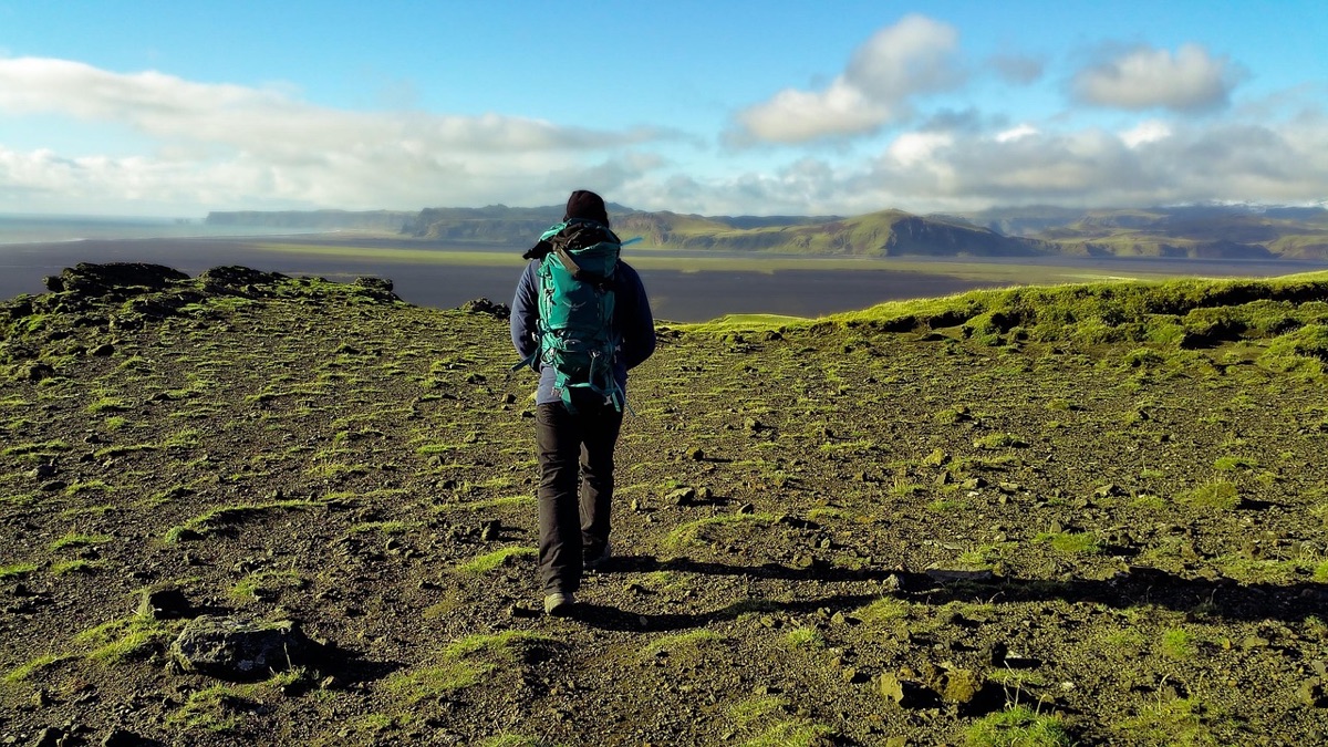 Hiker with backpack at Fuji mountain trail